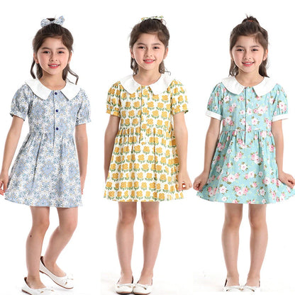 Girl wearing yellow plaid princess cotton dress with matching lace straw hat summer set