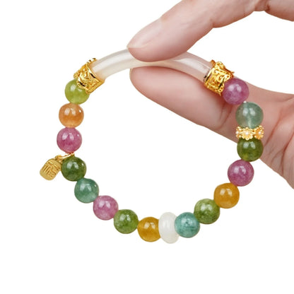 Tourmaline rainbow colour half bracelet with electroplated finish showing natural stone texture and partial wrist coverage design