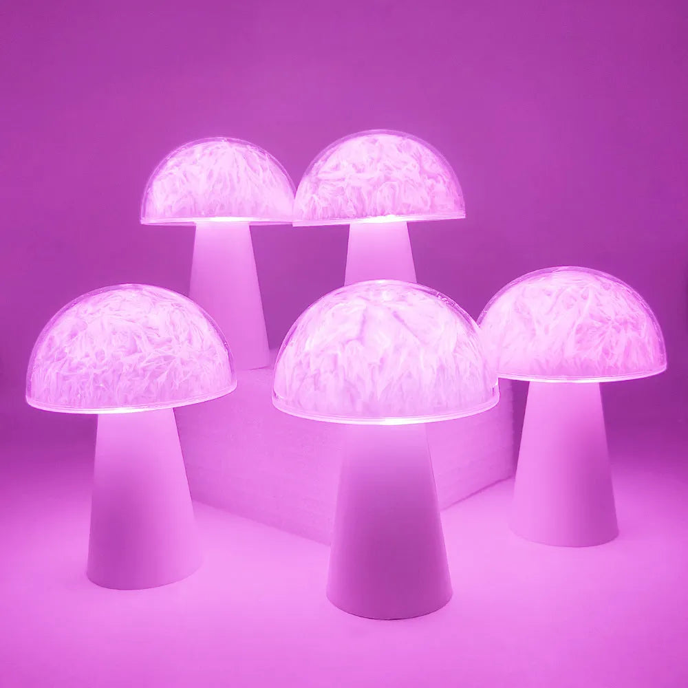Mushroom-shaped RGB colour-changing night light with remote control on a wooden surface