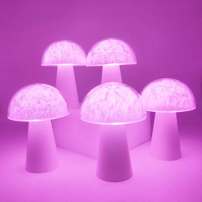 Mushroom-shaped RGB colour-changing night light with remote control on a wooden surface