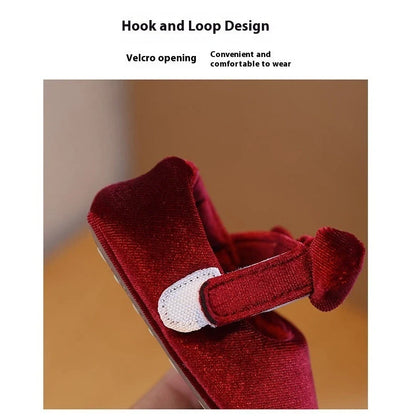 Wine red baby girl's shoes with elastic band closure and textured non-slip rubber soles