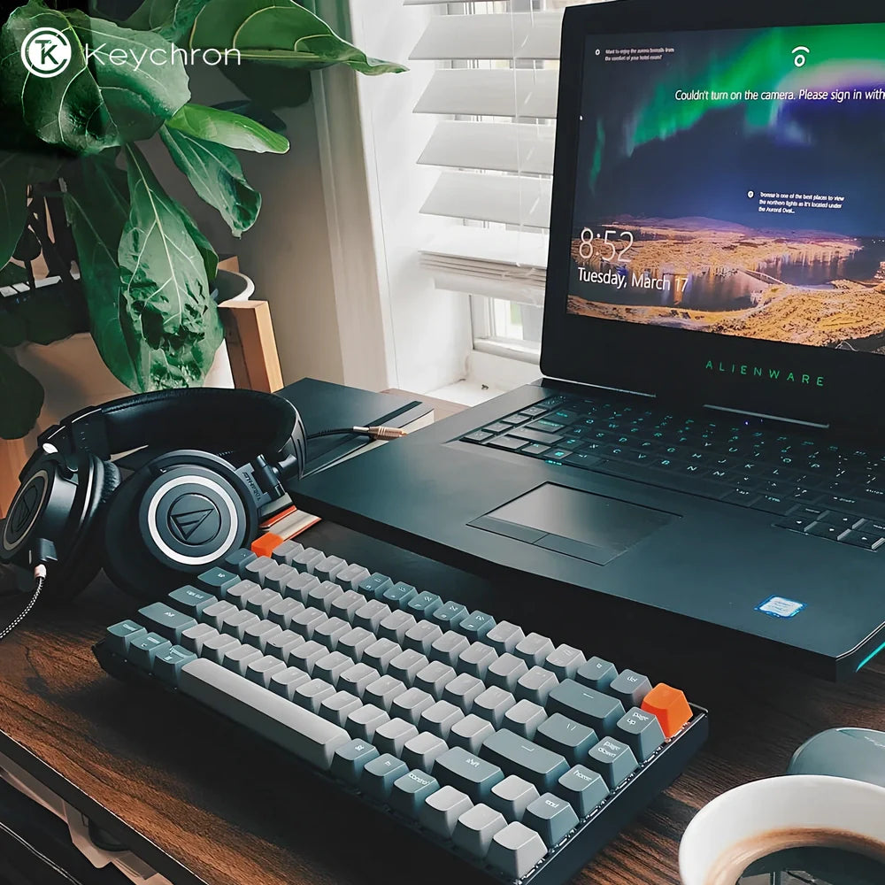 Grey 87-key mechanical keyboard with white backlight showing USB, Bluetooth and Type-C connectivity ports