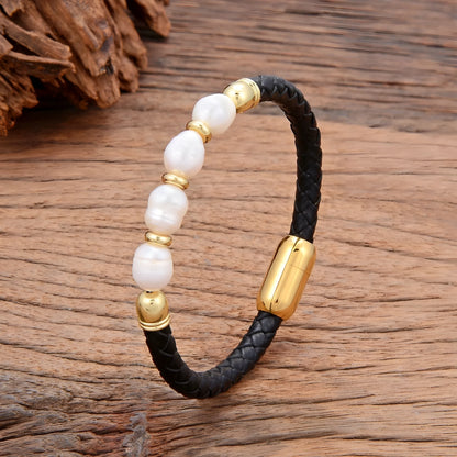 Handmade irregular shape pearl bracelet on a leather cord, showing adjustable loop closure.