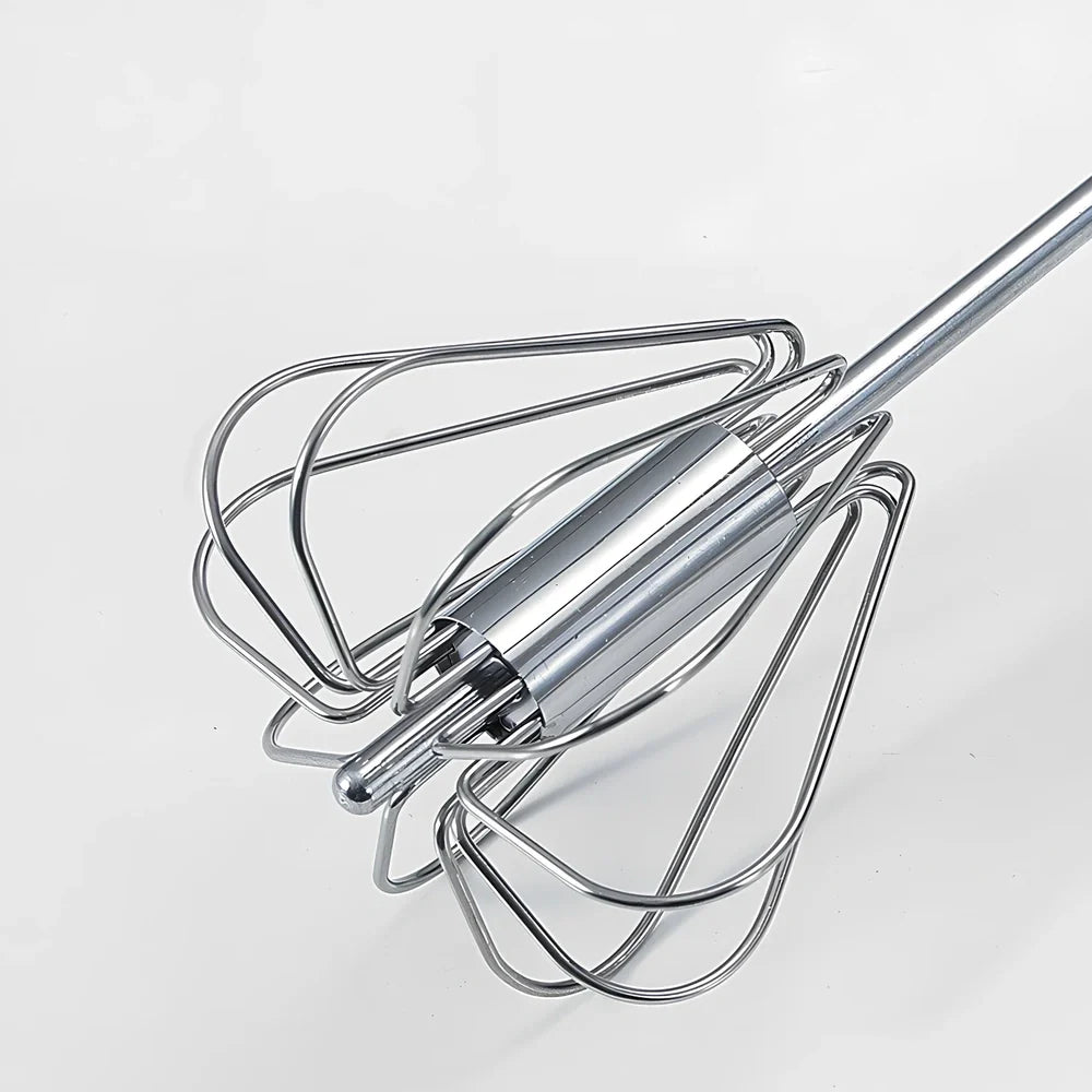Stainless steel manual egg beater showing three size options with green and orange handles