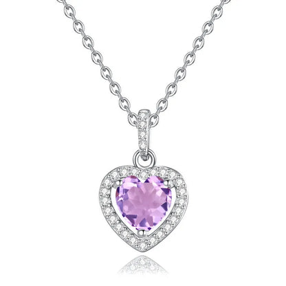 Sterling silver heart pendant necklace with a coloured gemstone on an adjustable chain.