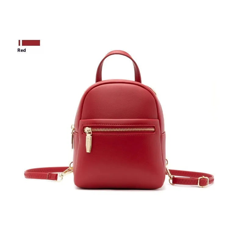 Soft PU mini backpack in multiple colours showing three-dimensional outer pockets and street style design.