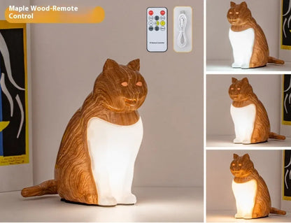 Cat-shaped USB rechargeable table lamp with adjustable colour temperature on wooden desk