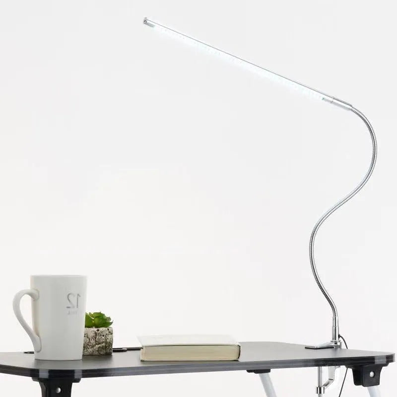 Silver aluminium alloy LED nail lighting table lamp with long arm and clip mounting for beauty workstations