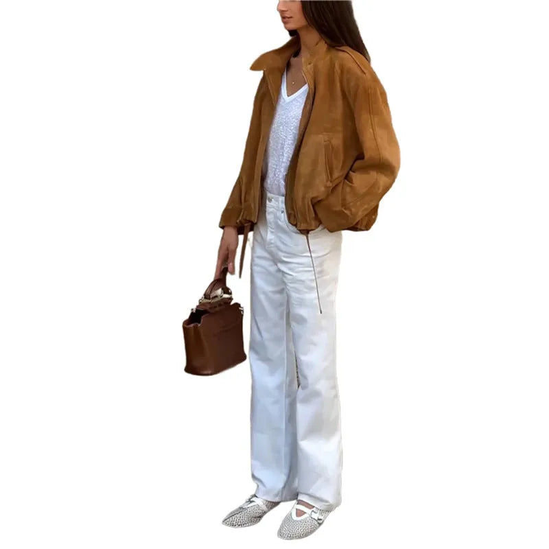 European and American retro solid colour jacket in loose fit with long sleeves, made from 100% polyester fabric.