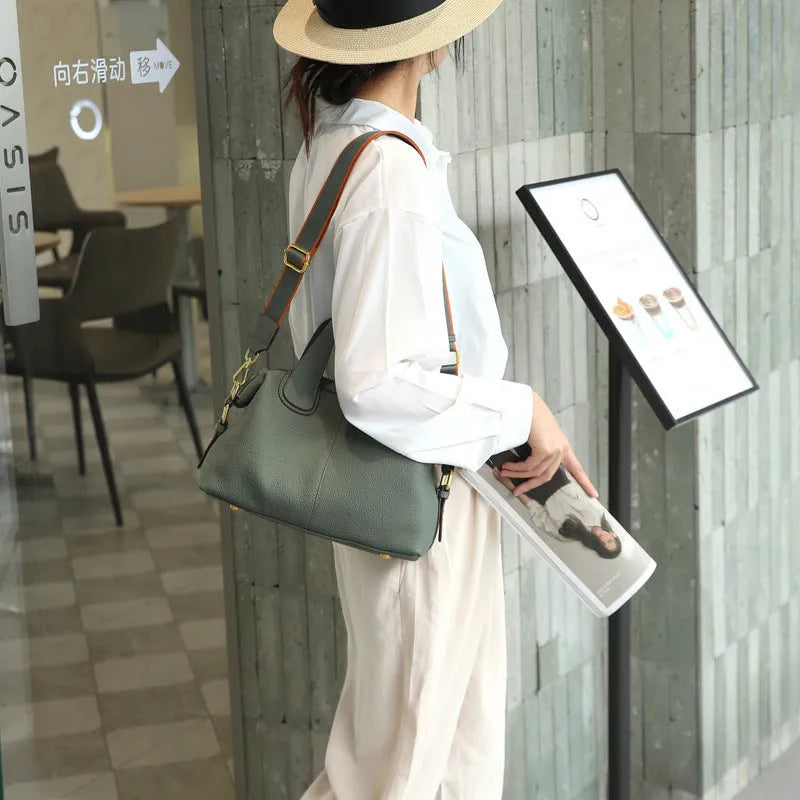 Women's genuine leather cross-body shoulder bag in horizontal square design with multiple internal compartments