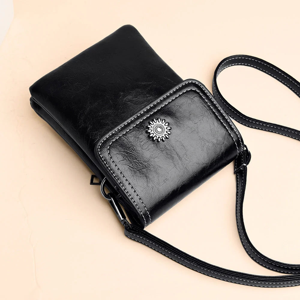 Stylish crossbody bag with mobile phone pocket, available in yellow, black, and brown colors