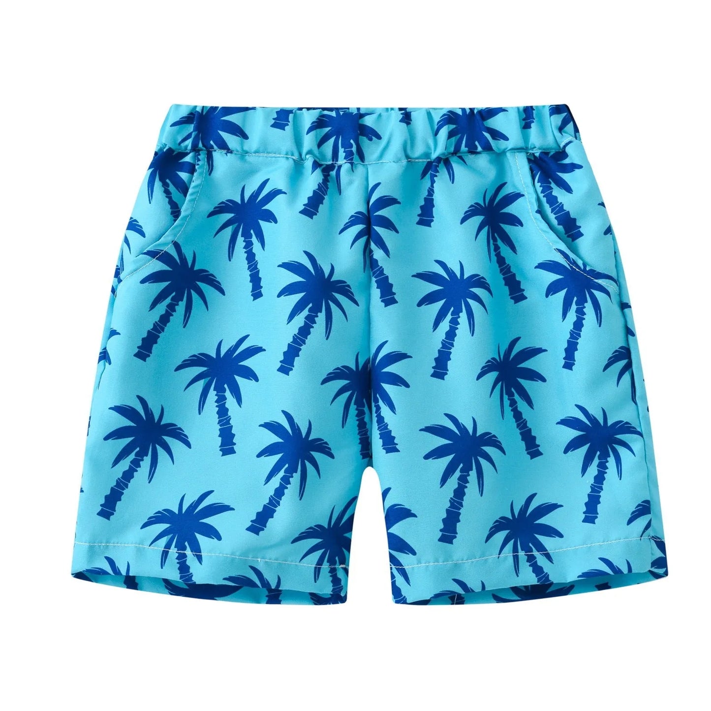Colourful printed beach shorts with elastic waistband showing tropical patterns including coconut trees and pineapples