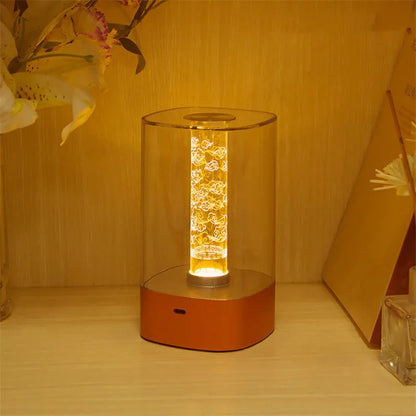 Rose Gold LED touch atmosphere lamp with abstract pattern on bedside table