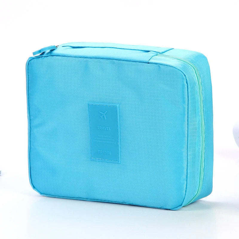 Stylish portable makeup bag with waterproof divider, multi-compartment storage, and variety of color options