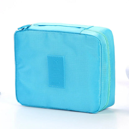 Stylish portable makeup bag with waterproof divider, multi-compartment storage, and variety of color options
