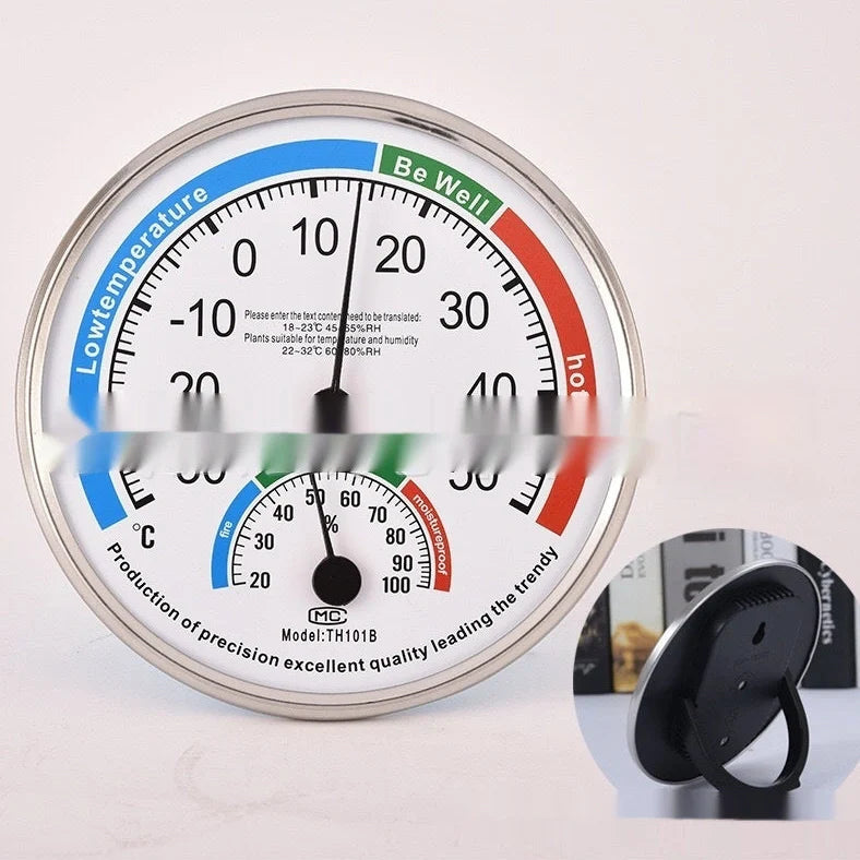 Indoor thermometer with black plastic pointer and red metal pointer on black or blue back shell
