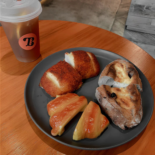 3D croissant silicone protective case for AirPods Pro 3rd gen with integrated hook, yellow bread design