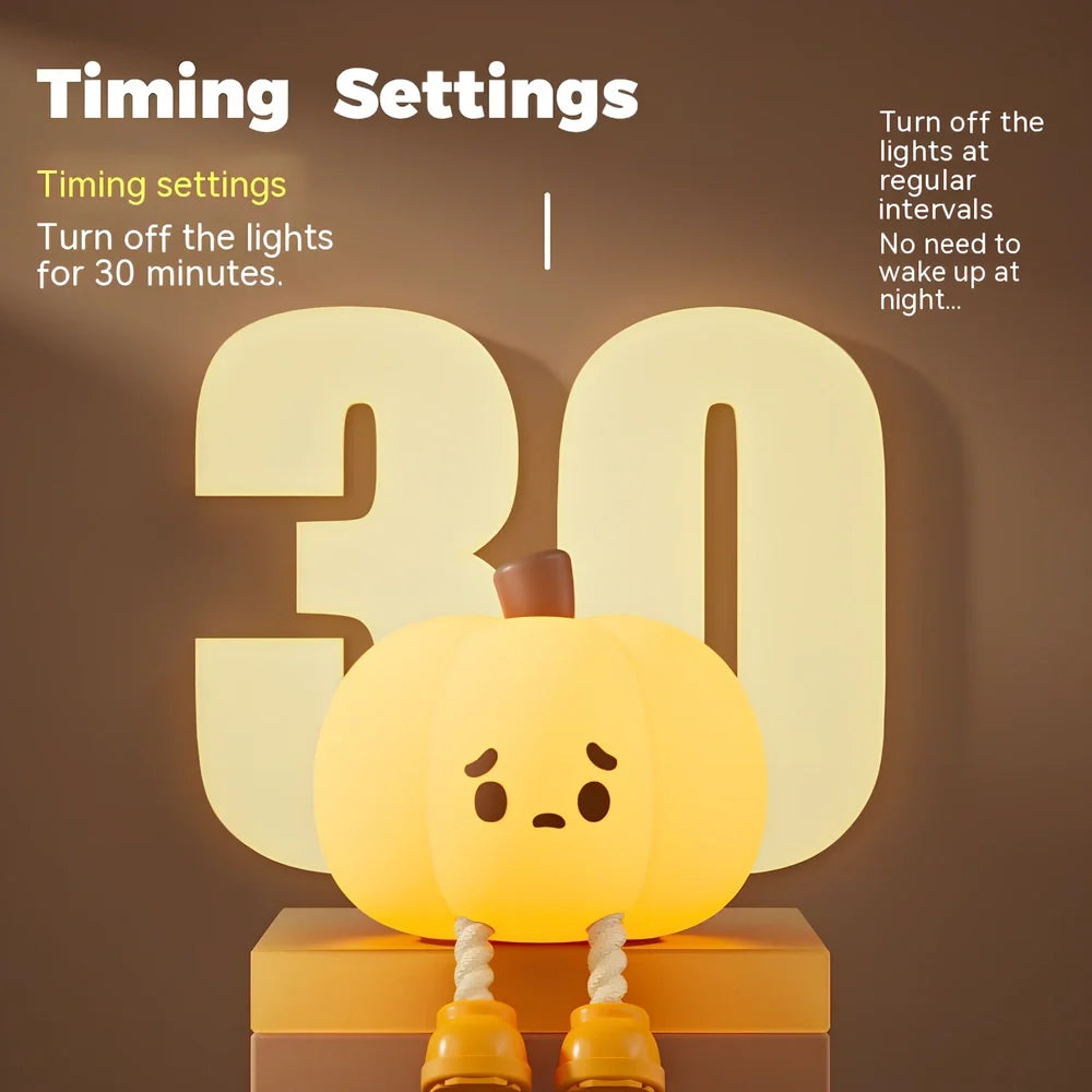 Orange silicone pumpkin night lamp measuring 98x105x83mm with built-in battery and USB charging port