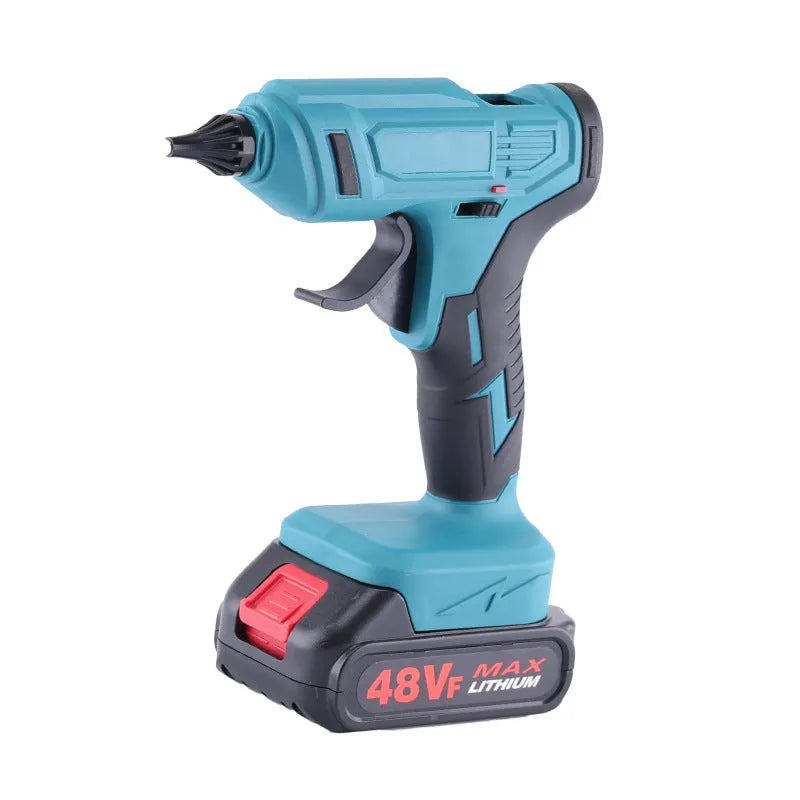 Cordless hot melt glue gun with bare metal body, two lithium batteries, charger, and pack of 11mm glue sticks.