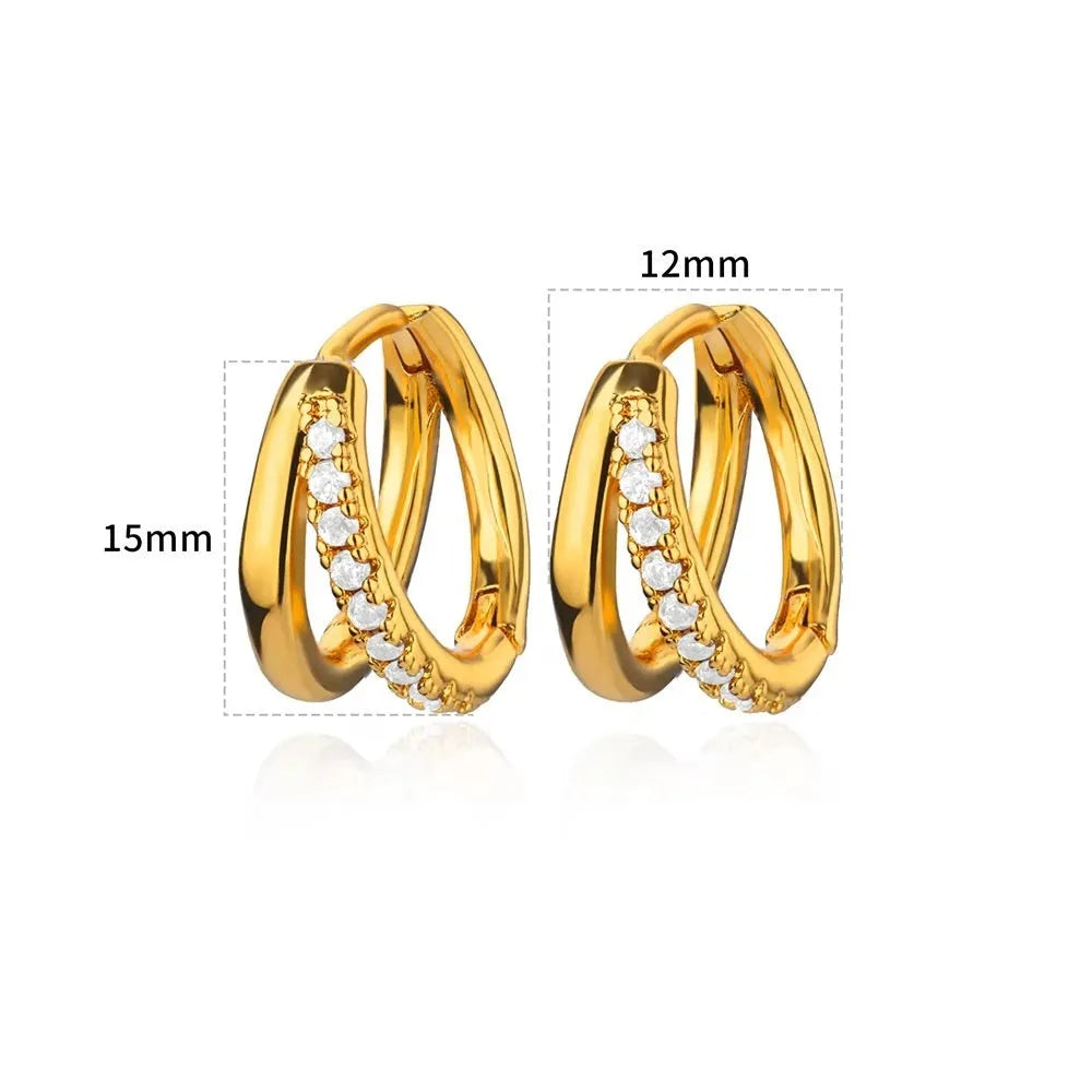 Women's irregular geometric butterfly earrings in copper with diamond treatment, showing heart-shaped and star designs in various colours