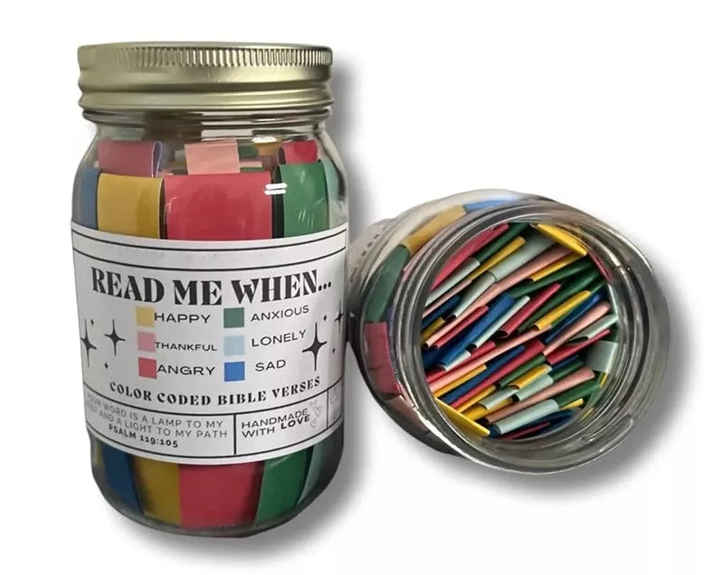 Handmade glass jar containing 67 color-coded Bible verses for emotional support