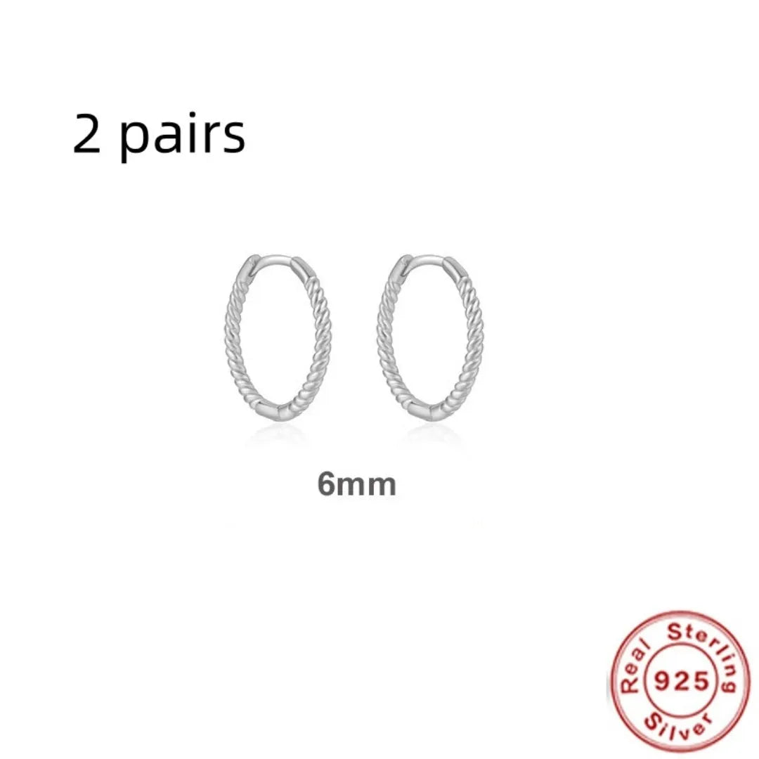 Sterling silver twisted string round ring earrings in gold or platinum colour.