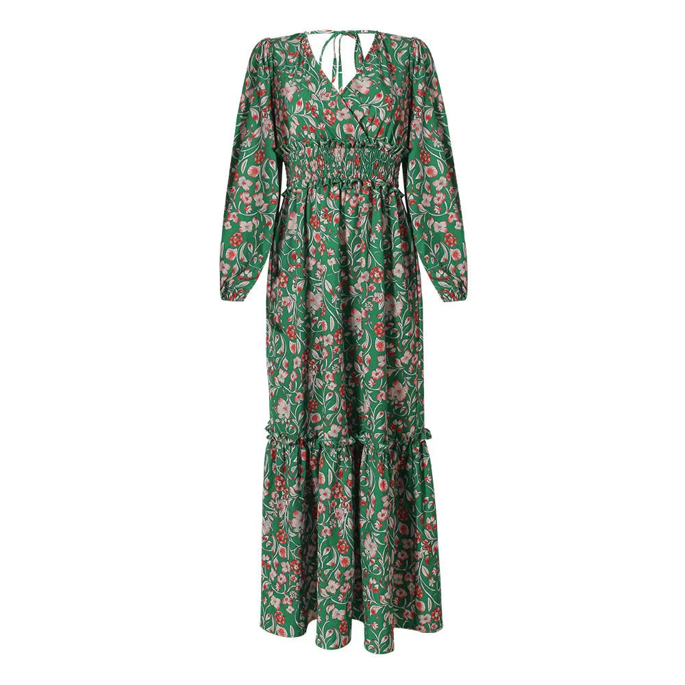 A green halter dress with a vibrant printed pattern and lantern sleeves.