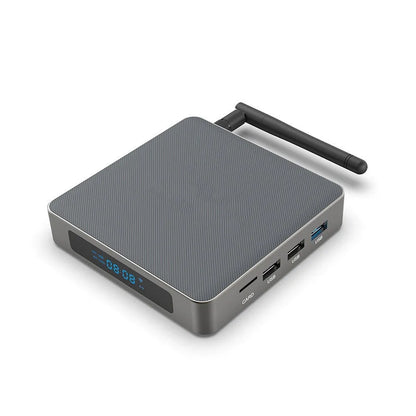 Android TV set-top box with remote control showing HDMI and power ports