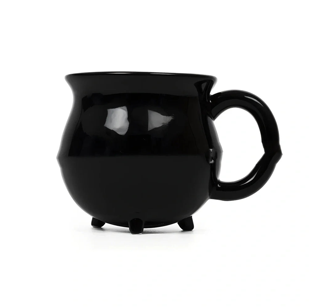 Black ceramic witch coffee mug with cartoon design showing 350ml capacity