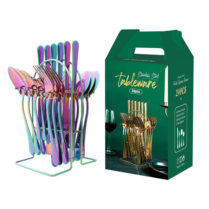 24-piece stainless steel cutlery set with knives, forks, spoons, and teaspoons on a storage rack in a gold finish.
