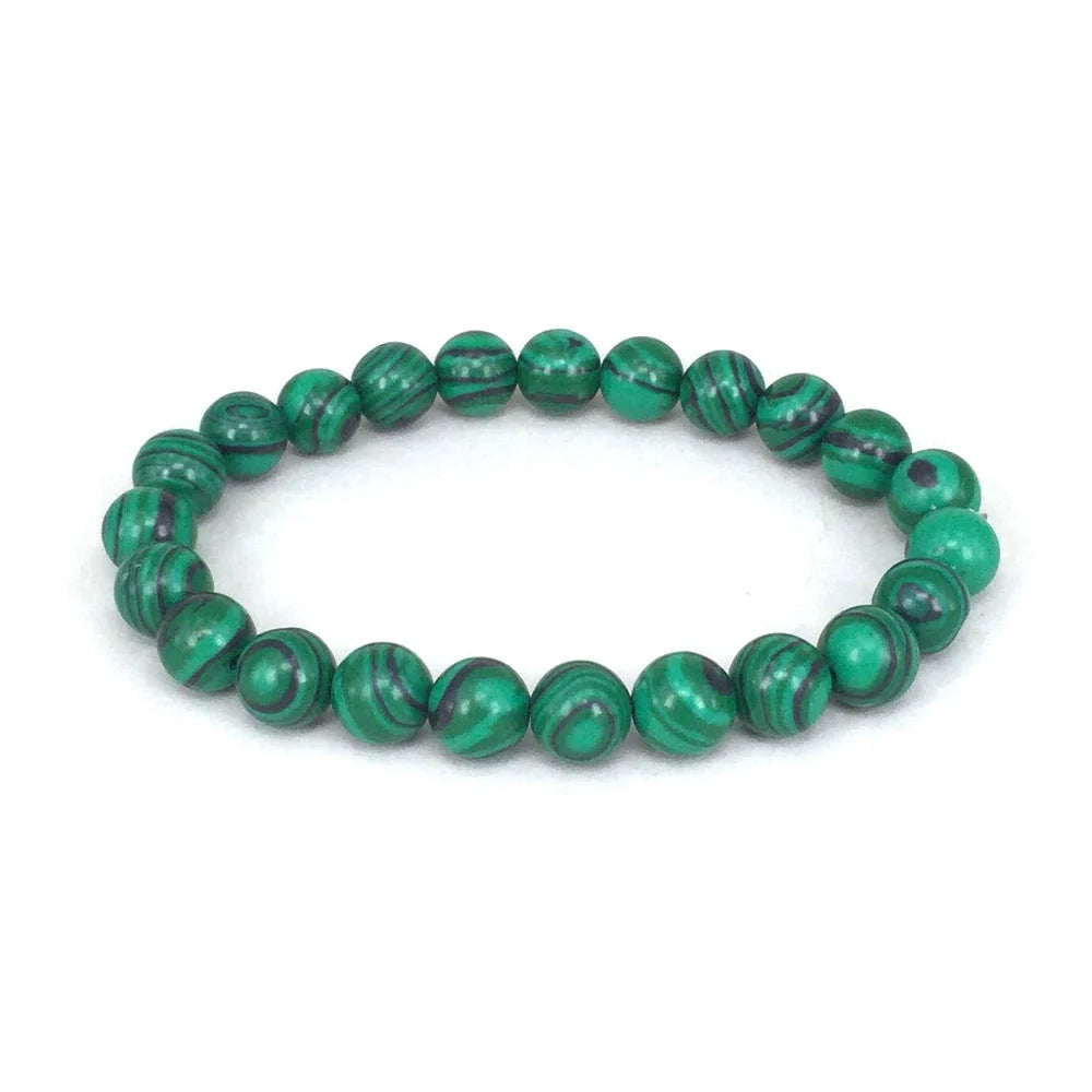 Elegant malachite stone bracelets with unique textures and patterns, perfect for a stylish accessory.