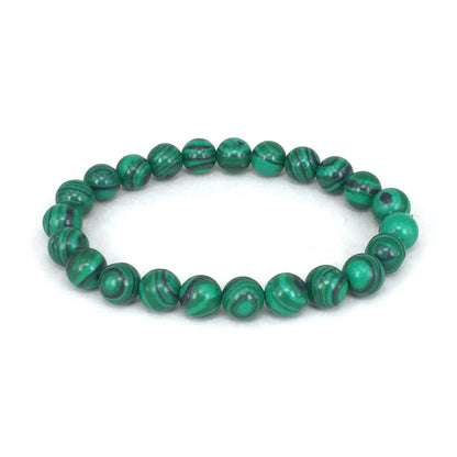 Elegant malachite stone bracelets with unique textures and patterns, perfect for a stylish accessory.