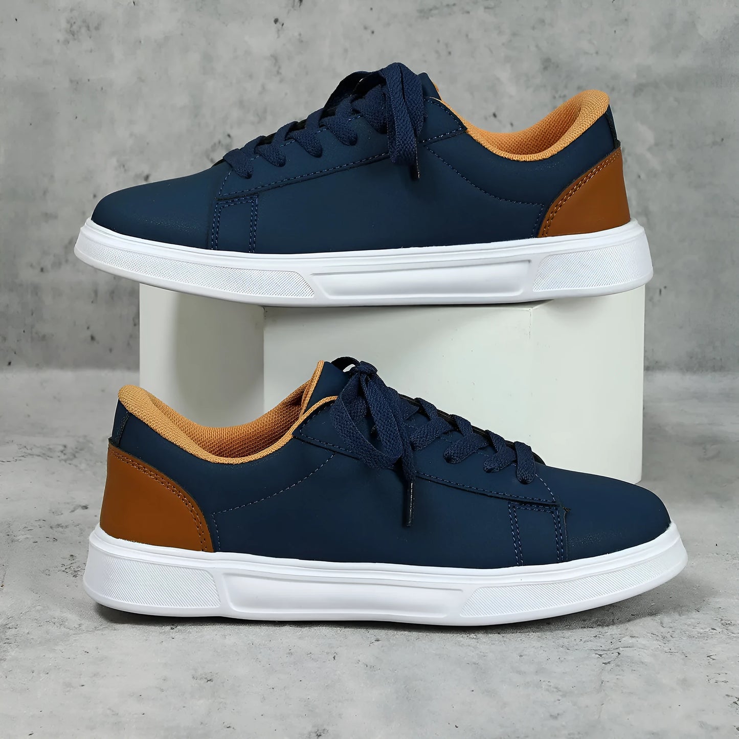 Beige brown women's low-top platform casual sneakers with a cross strap and round toe on a white background.