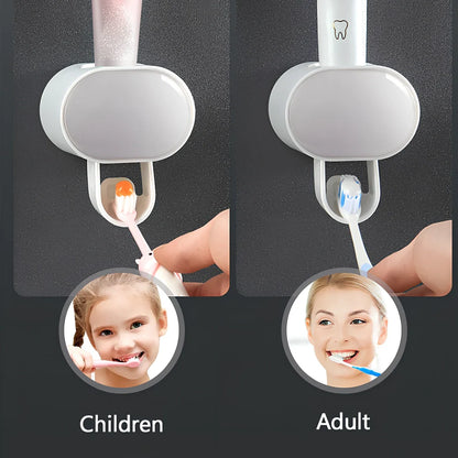 Black wall mounted automatic toothpaste dispenser with squeeze mechanism and dustproof toothbrush storage