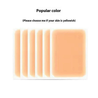 Tattoo cover patch and a 130mm long concealer brush on a table, with colour option swatches visible.