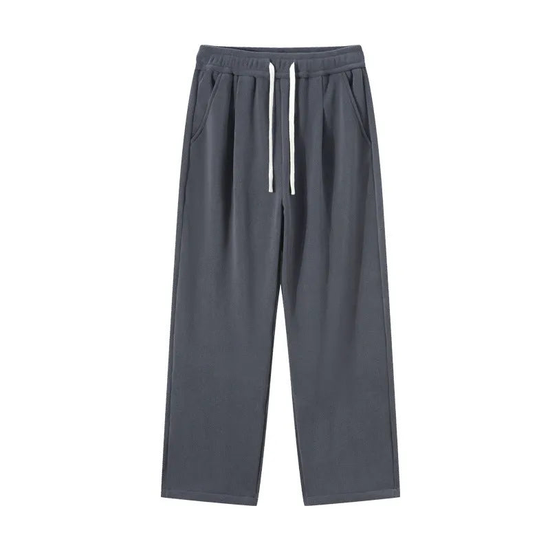 Men's double-sided polar fleece-lined trousers in apricot, black, or dark grey with elastic waist and loose fit for winter.