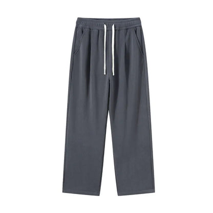 Men's double-sided polar fleece-lined trousers in apricot, black, or dark grey with elastic waist and loose fit for winter.