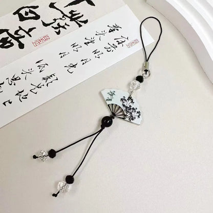 Guofeng Chinese style bead pendant keychain with detailed plants and flowers pattern on a metal clip.