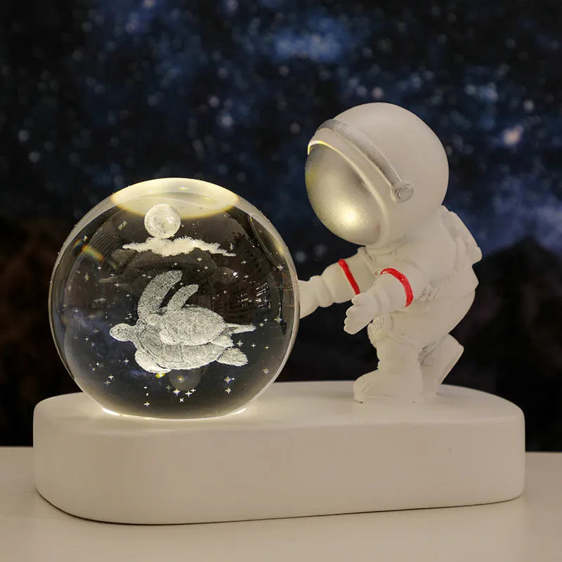 Astronaut crystal ball night light projecting galaxy pattern on 6cm resin sphere with USB cable