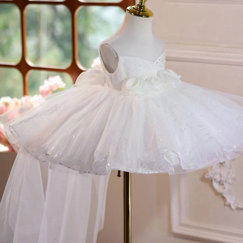 White children's princess wedding dress with sleeveless design and round neck collar