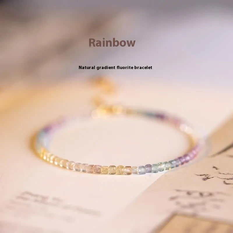 Women's handmade bracelet with rainbow fluorite stones in copper geometric quadrilateral settings