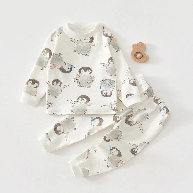Cotton baby long johns set with penguin cartoon design, showing long sleeves and pants