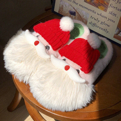 Cozy Santa Claus-themed Christmas slippers with plush upper and non-slip EVA sole for indoor comfort and traction