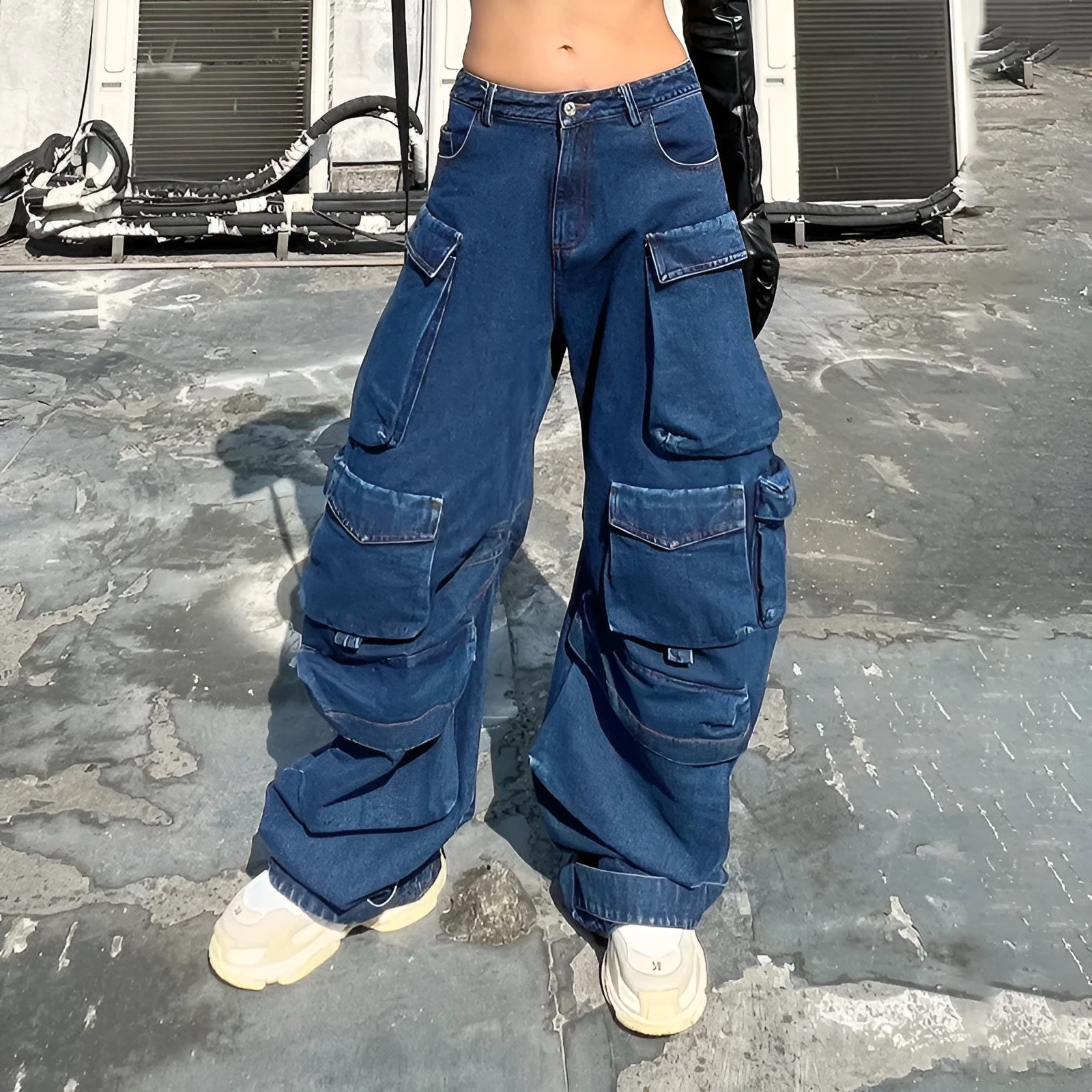 Dark blue distressed wide-leg jeans with high waist and multiple pockets on cotton denim fabric