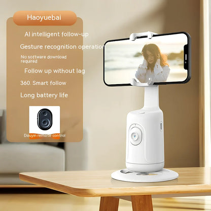 Automatic tracking stabilizer in black with 360 degree rotation on desk, USB connected, 175.2 x 54.8 x 57mm size