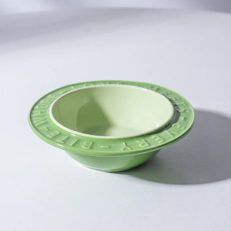 Ceramic cat bowl with iron anti-tip frame in blue colour with silicone pad