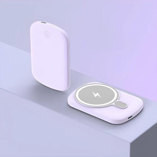 Magsafe magnetic wireless power bank in black, attached to an iPhone.