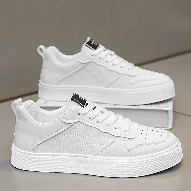 Stylish plaid lace-up sneakers with breathable mesh lining and durable rubber sole for casual comfort and versatile style.