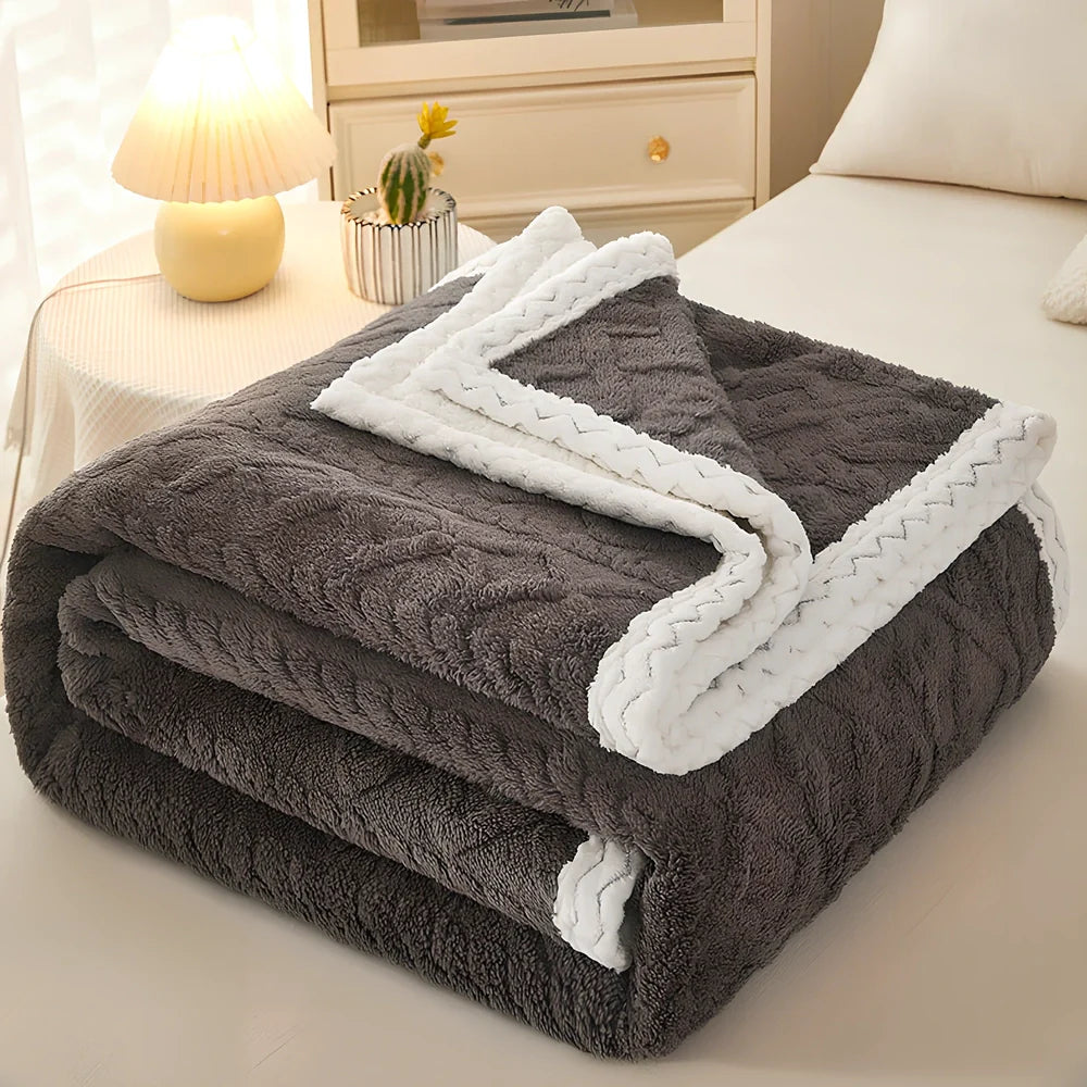Double-thickened coral fleece sofa blanket in caramel colour showing dense texture and substantial thickness