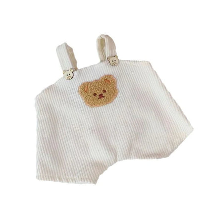 30cm doll clothing collection showing multiple outfit pieces including hooded jackets, sweaters, and suspender pants